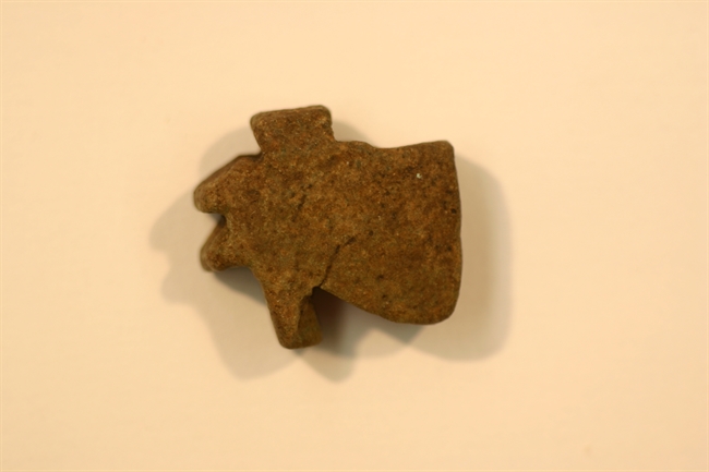 Udjat eye amulet made of lightgreen-brow faience